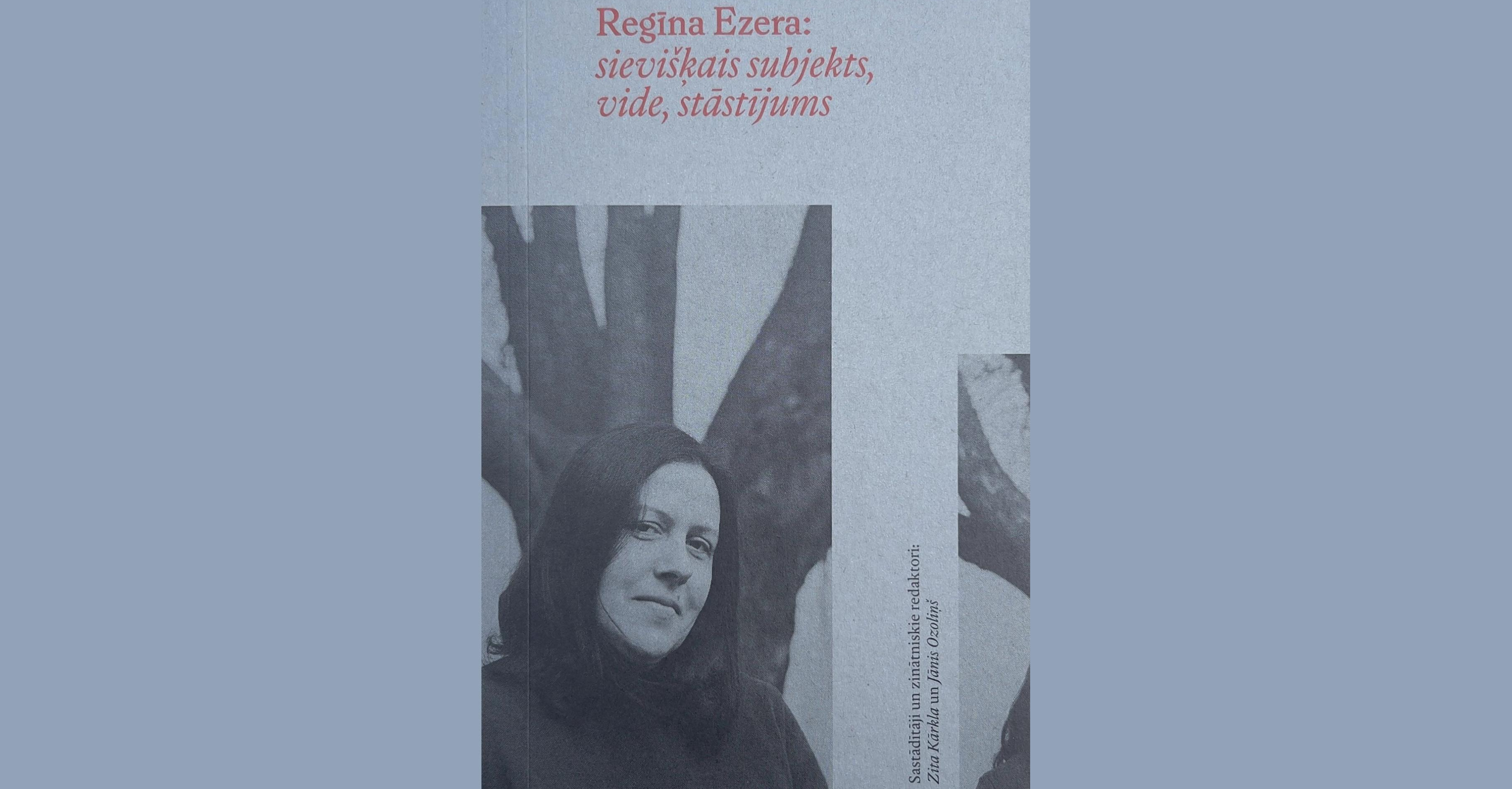 Grāmatas vāks ar Regīnas Ezeras portretu un nosaukumu 'Regīna Ezera: sievišķais subjekts, vide, stāstījums'. Vāka fonā redzams pelēcīgs koka stumbrs, teksts sarkanā un melnā krāsā